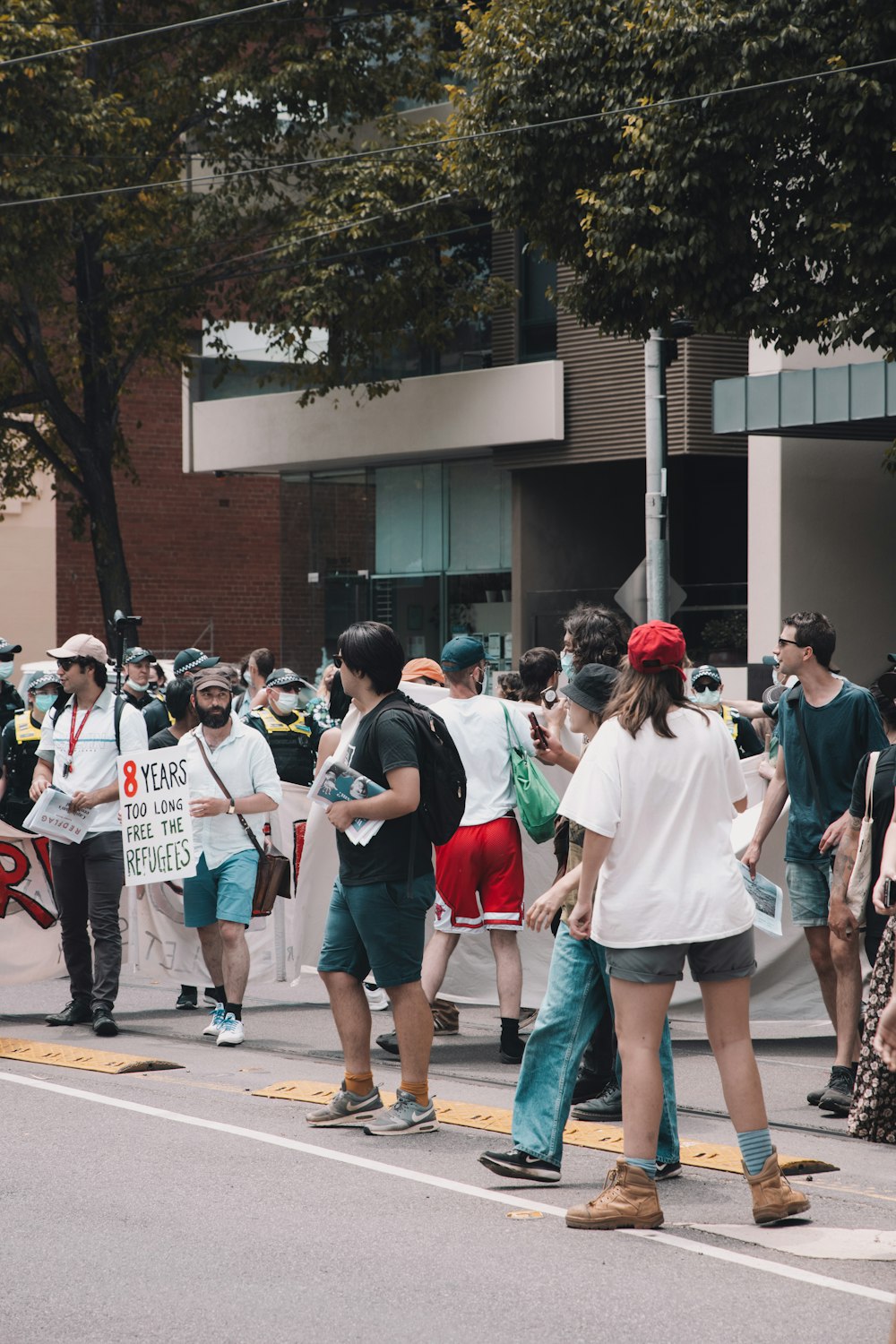 people walking on pedestrian lane during daytime