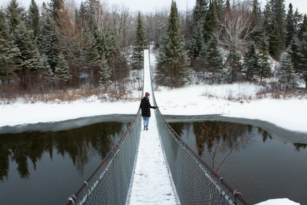 brown wooden bridge over river