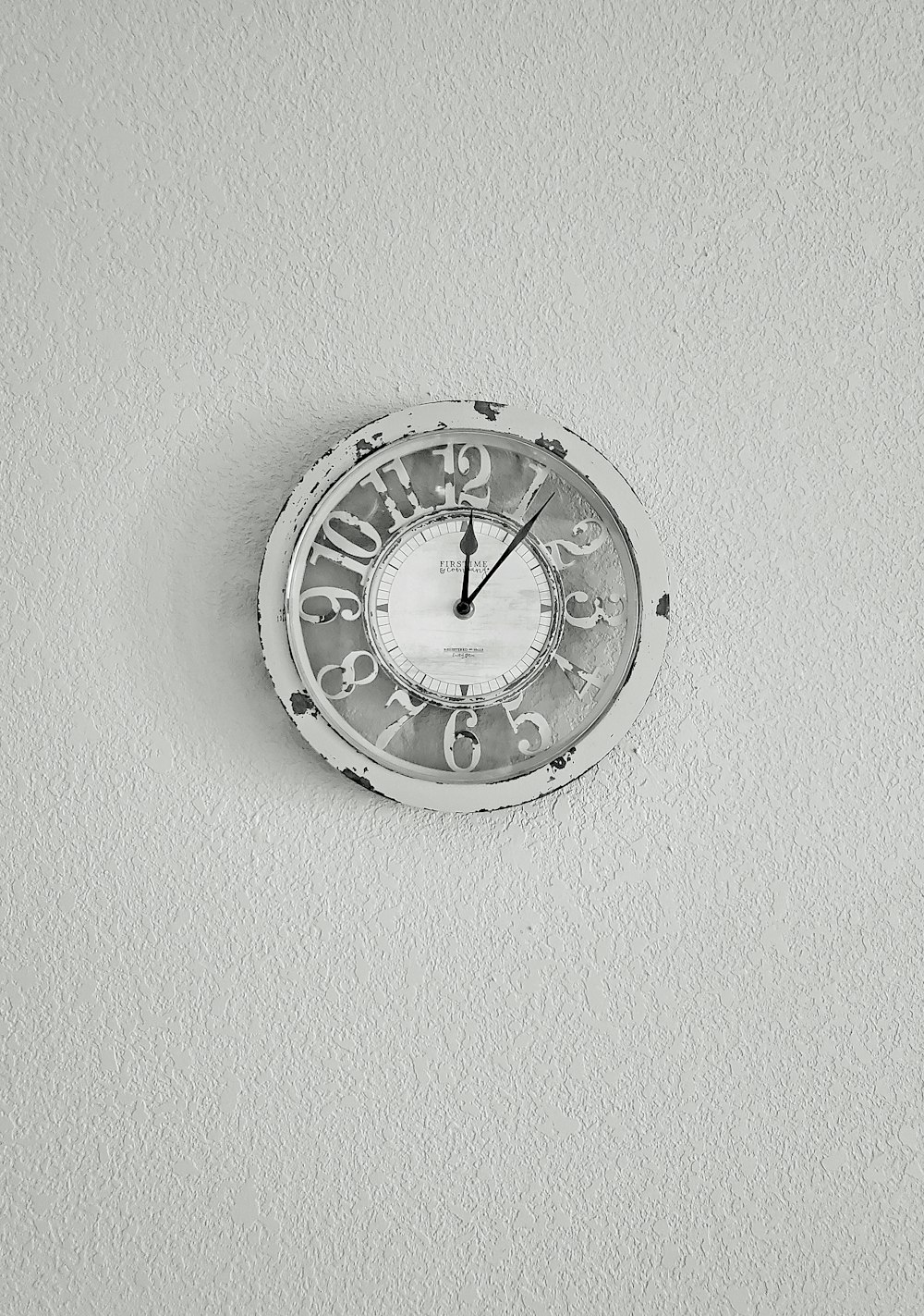 silver round analog wall clock