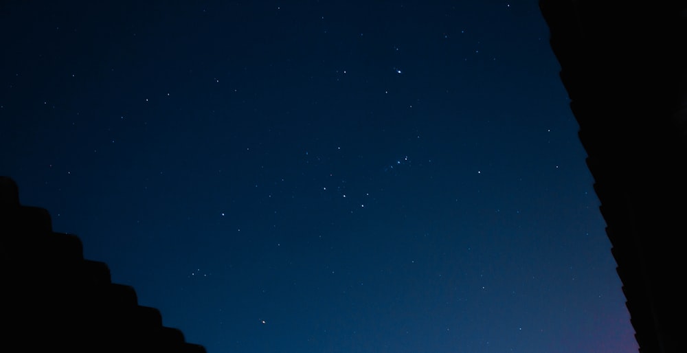 blue sky with stars during night time