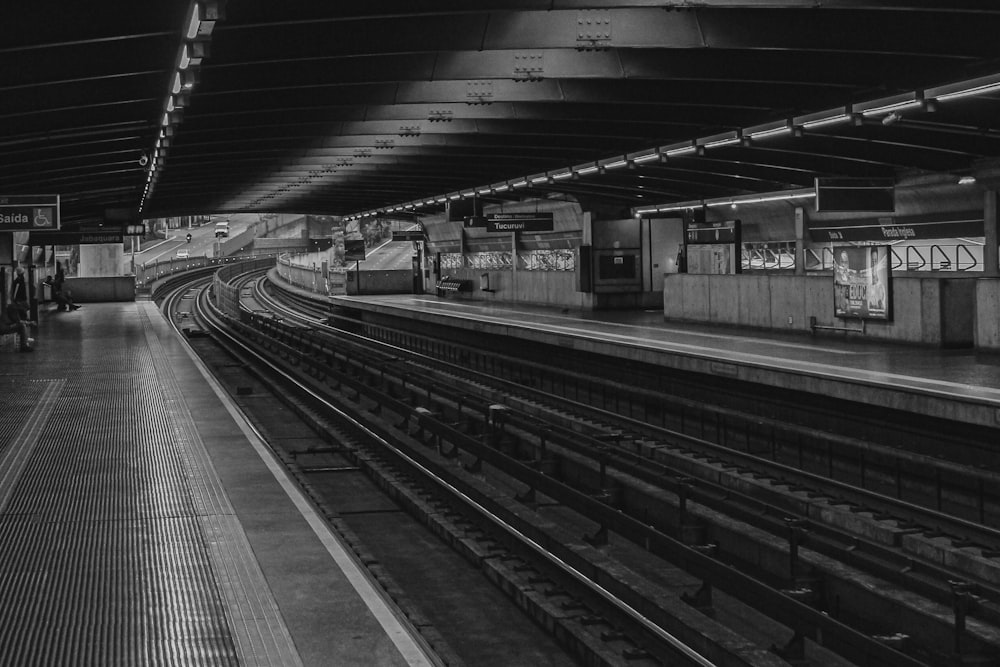 grayscale photo of train station