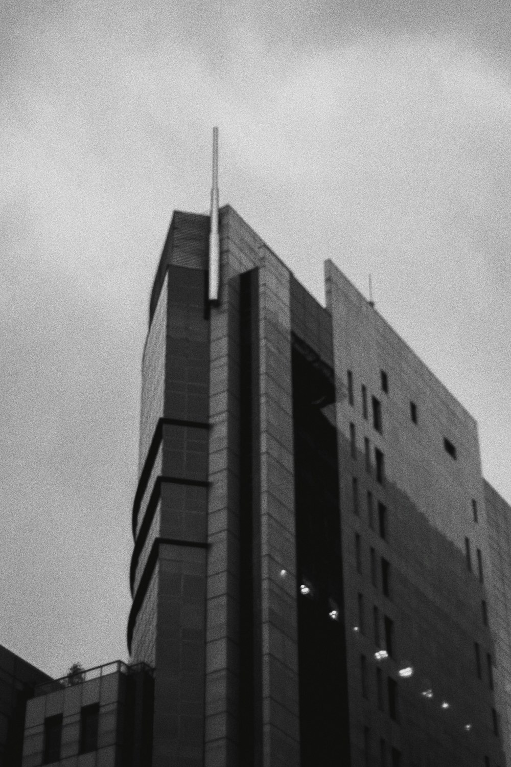 grayscale photo of high rise building