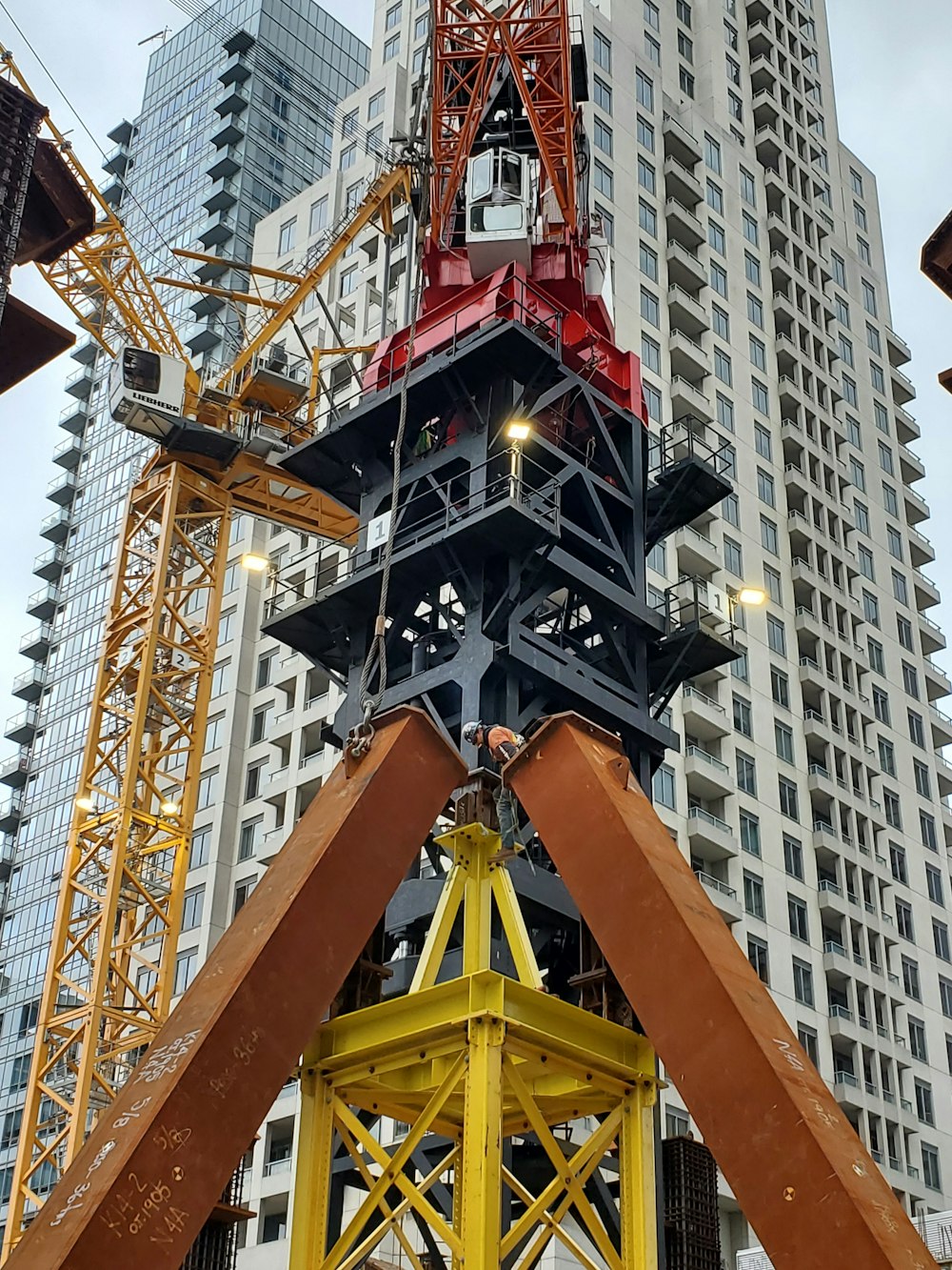 yellow and red metal crane