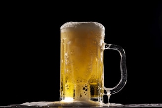 clear glass beer mug with beer