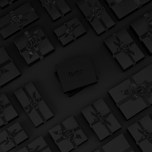 A collection of neatly arranged black gift boxes with ribbons, set on a dark background. One box in the center is slightly raised and has the word 'Bettr' printed on it.