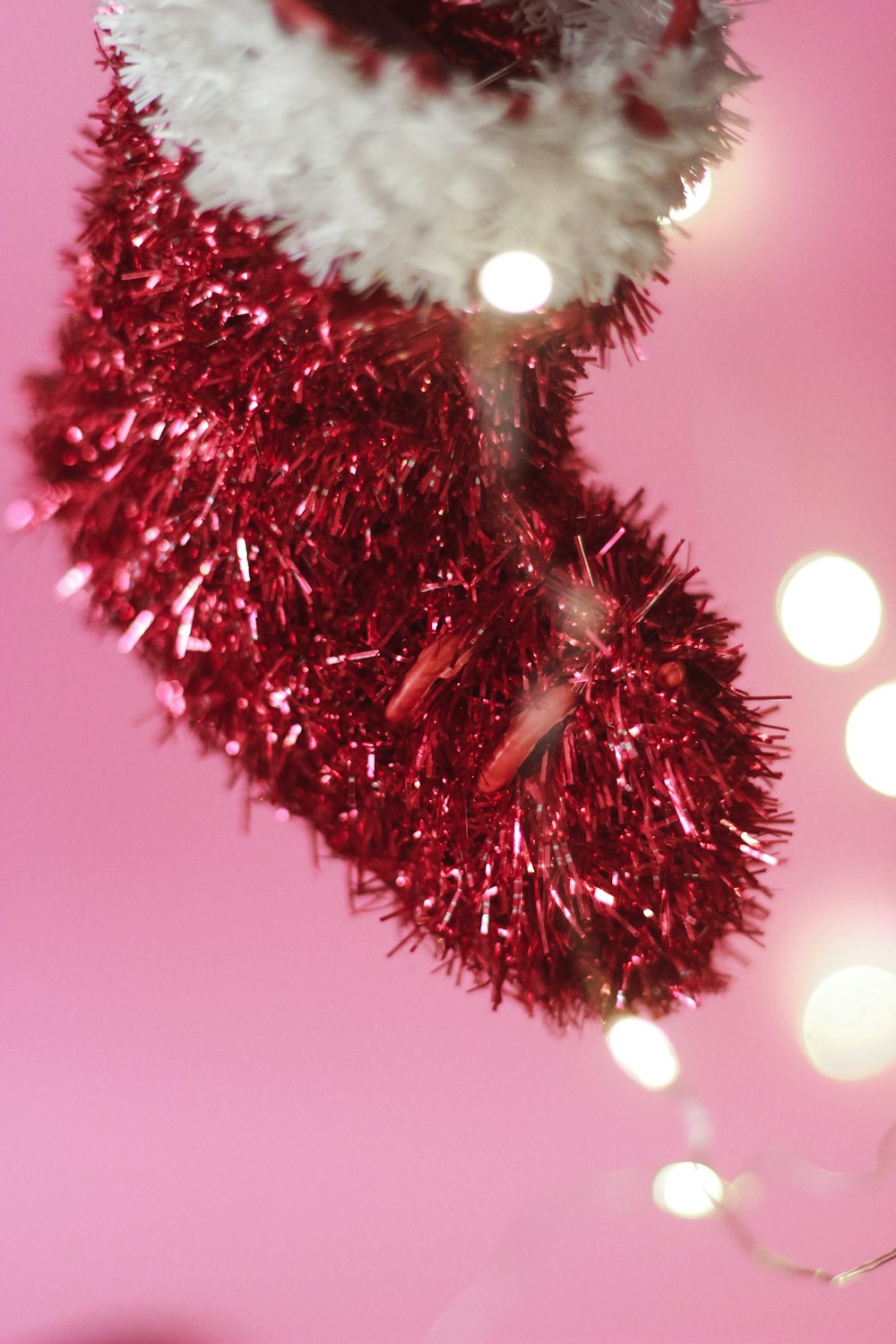 red and white fur ball ornament