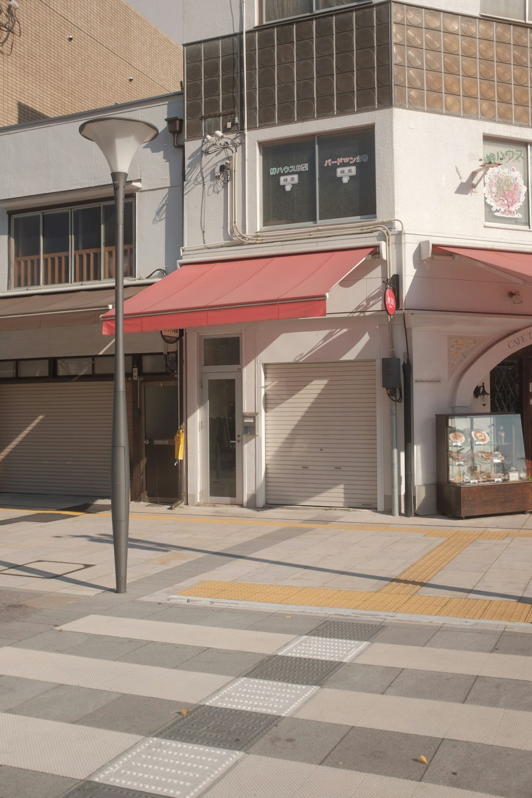 white and red store front during daytime