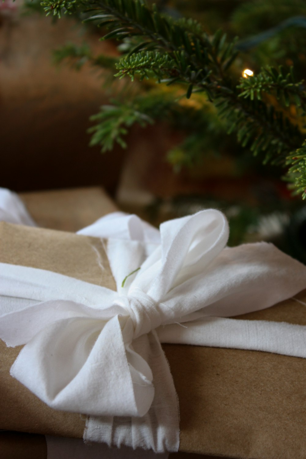 white textile on brown textile