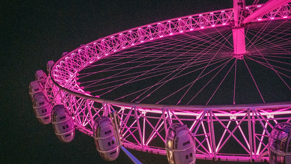 blue and white ferris wheel during night time