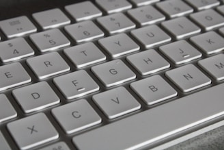 silver and white scissor-switch keyboard