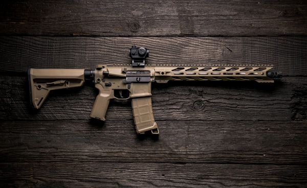 black and brown assault rifle