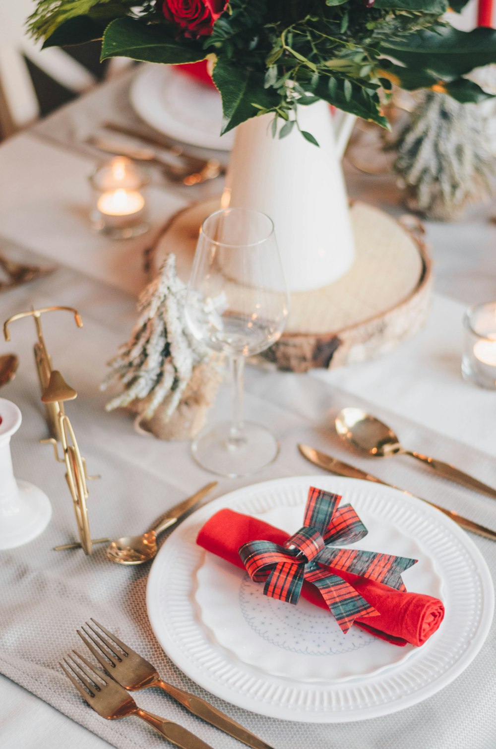 red and white ribbon on gold round tray