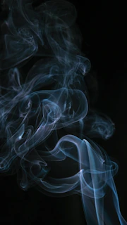 white smoke in black background