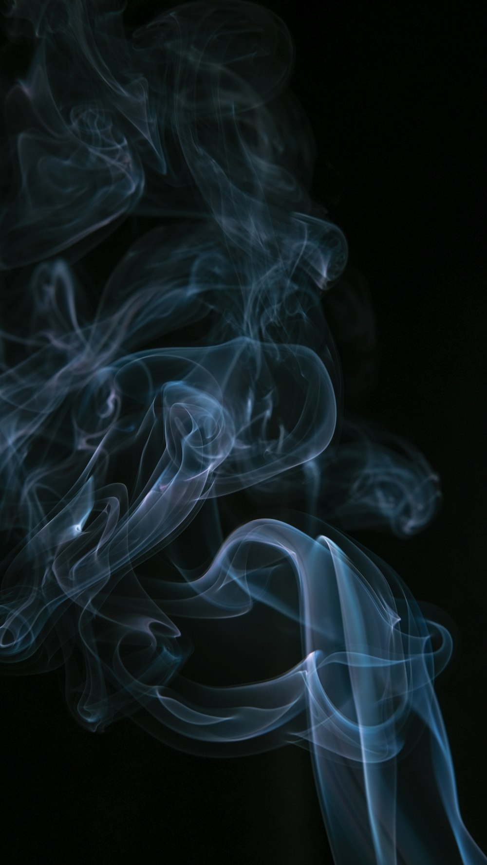 white smoke in black background