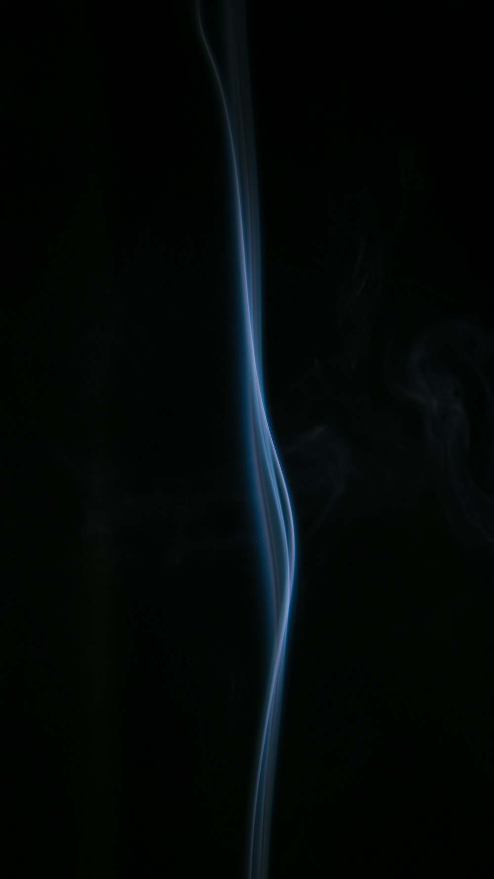 white smoke on black background