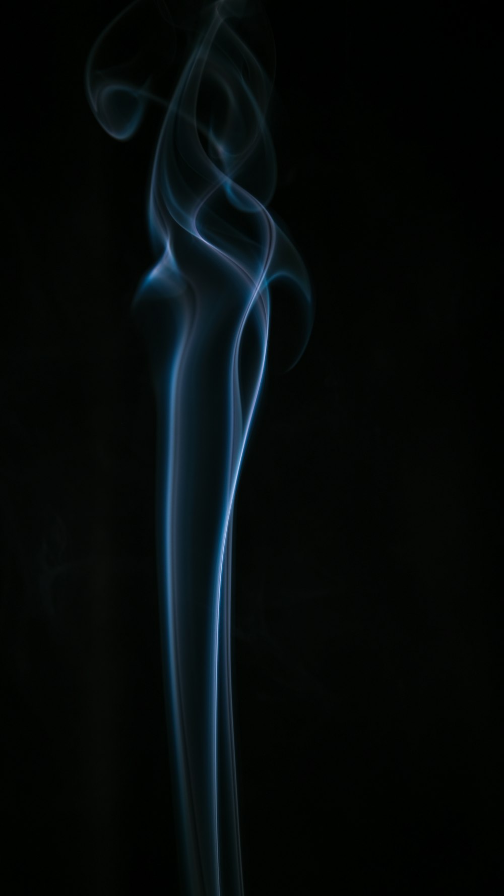 white smoke on black background