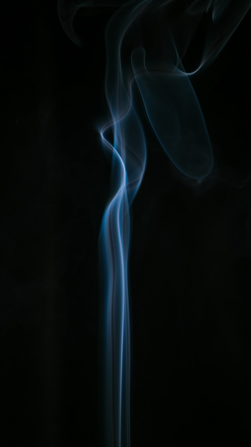 white smoke on black background