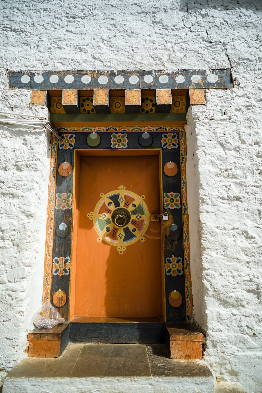brown wooden door with gold door knob