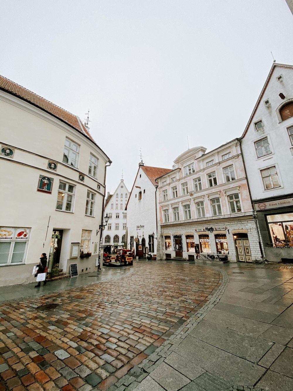 people walking on street near buildings during daytime