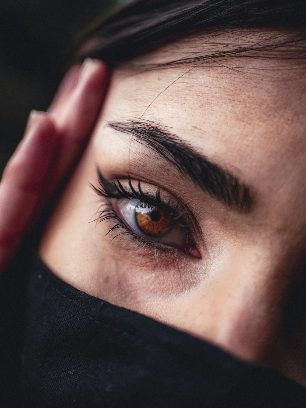 woman with black eye shadow