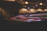 a sound mixing console in a recording studio