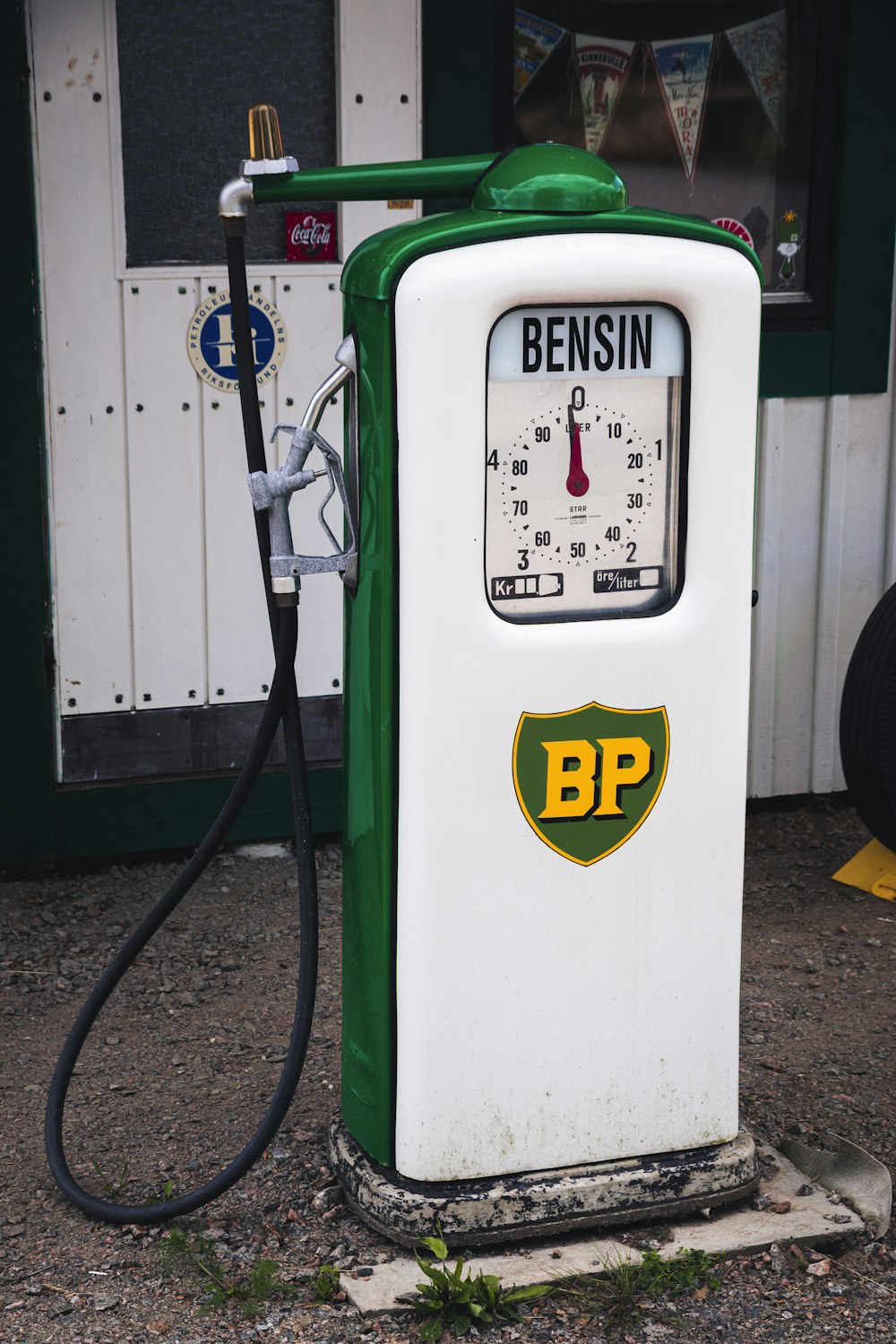 white and red gas pump