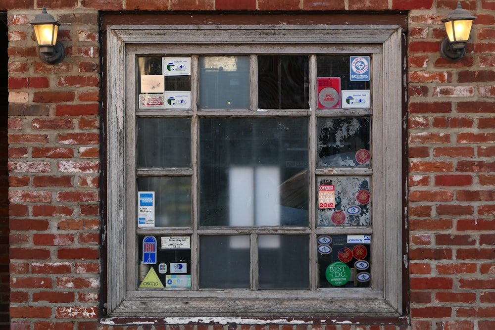 brown wooden framed glass window