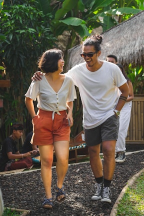 man in white crew neck t-shirt and woman in white crew neck t-shirt