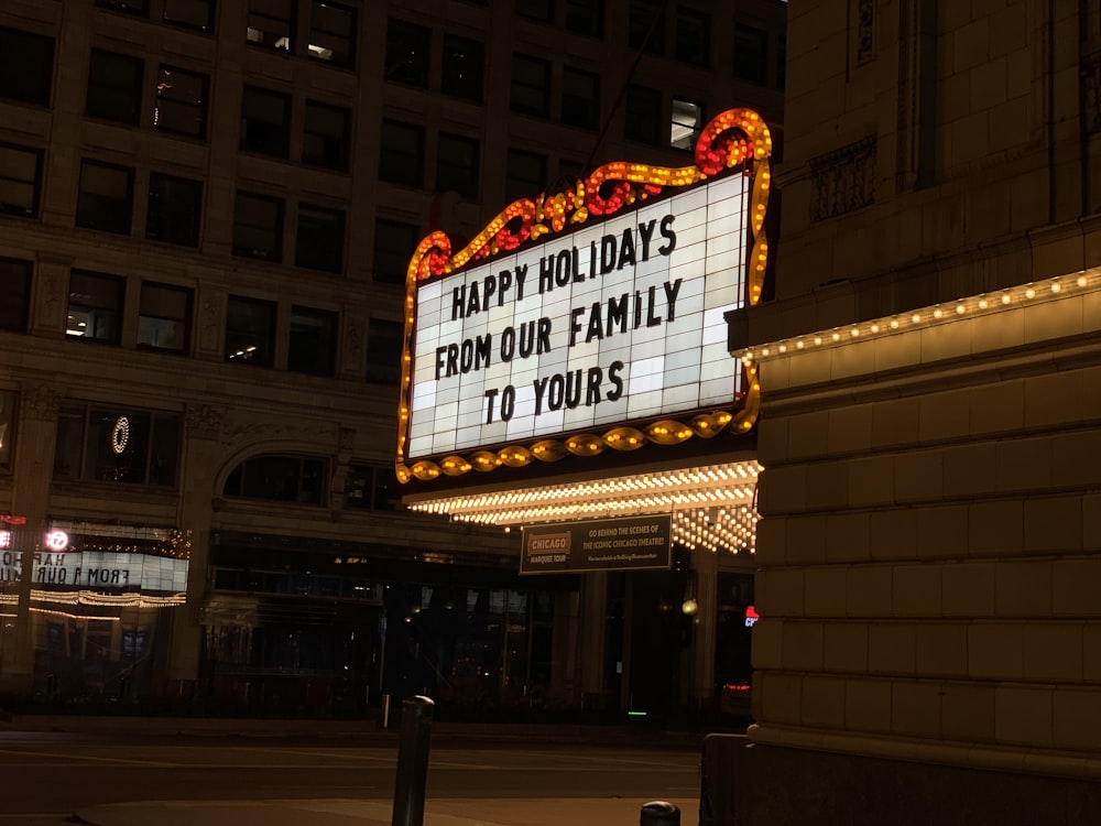 a marquee sign with a message written on it