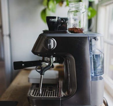 black and silver coffee maker