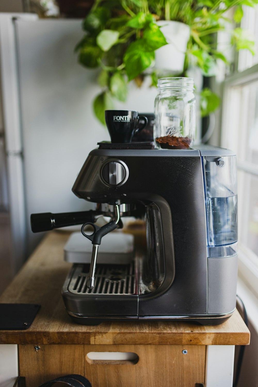 black and silver coffee maker