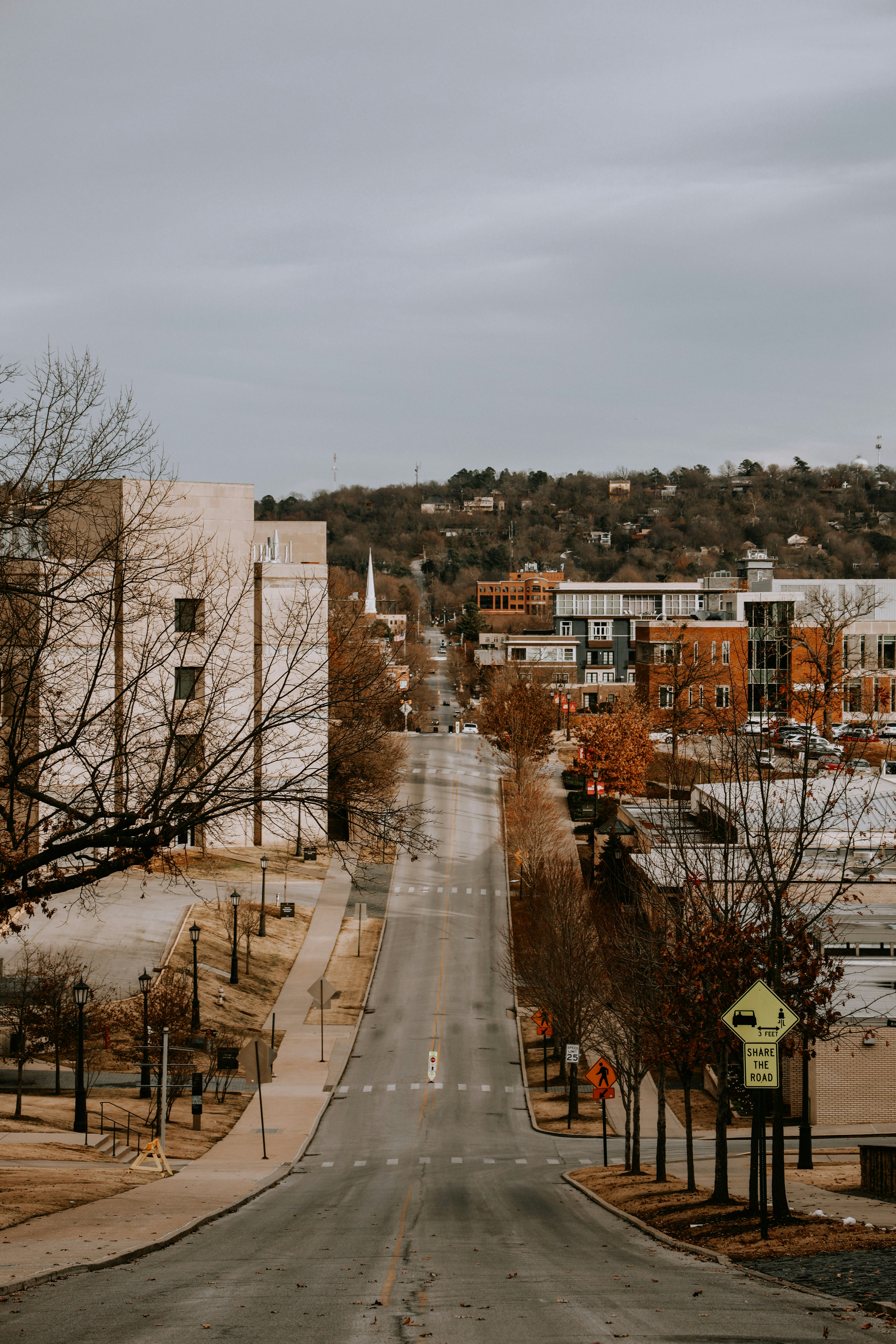 brown concrete building near road during daytime