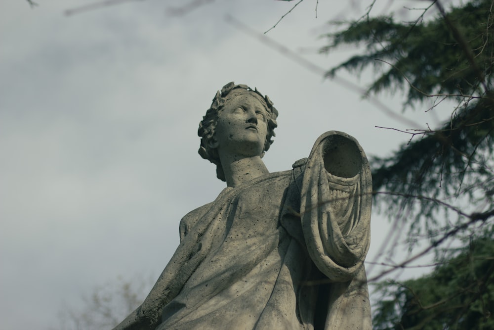 gray concrete statue of man