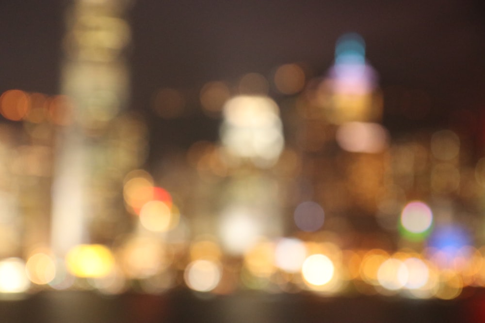 bokeh photography of city lights during night time