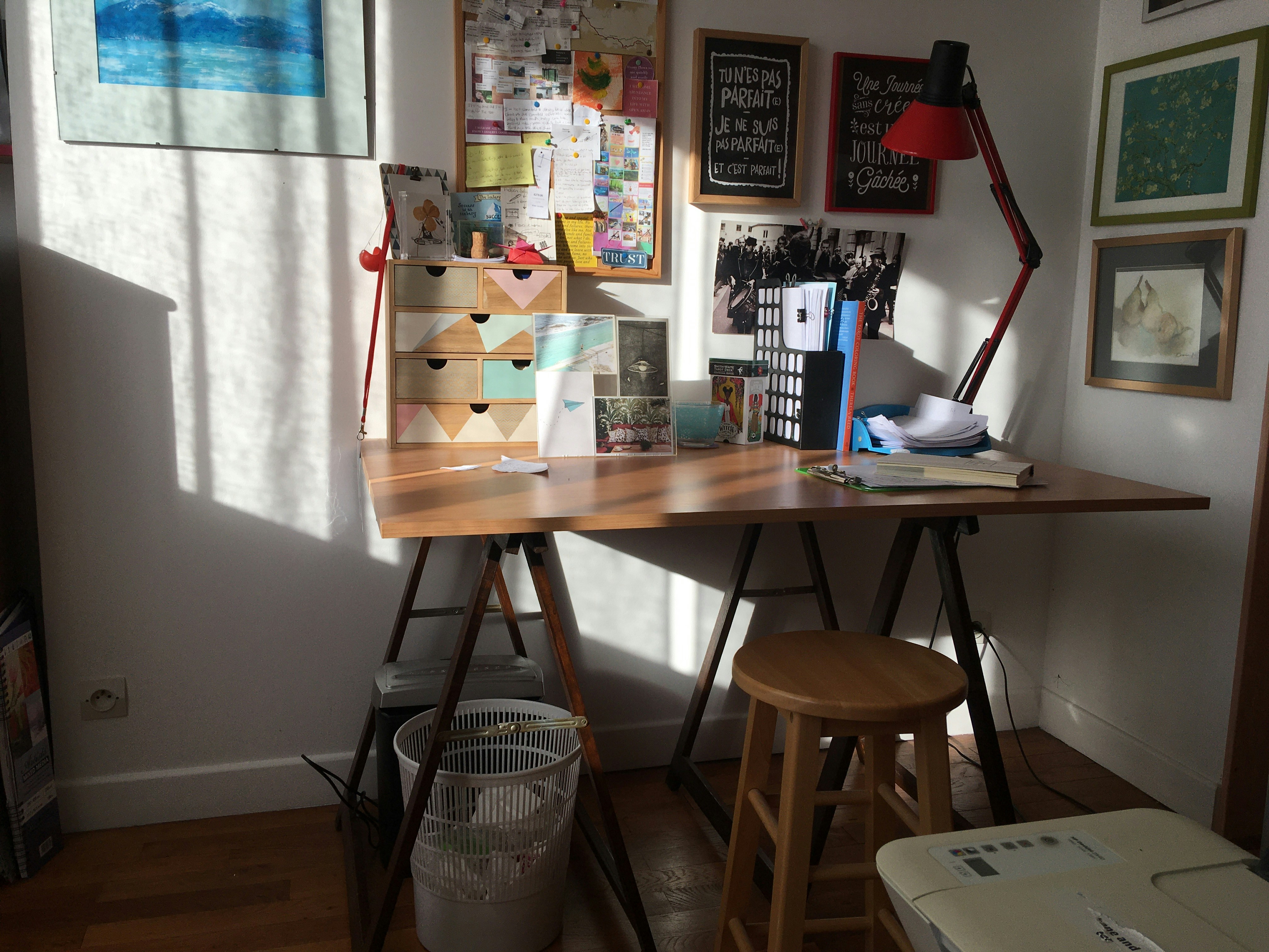 Brown wooden table with laptop