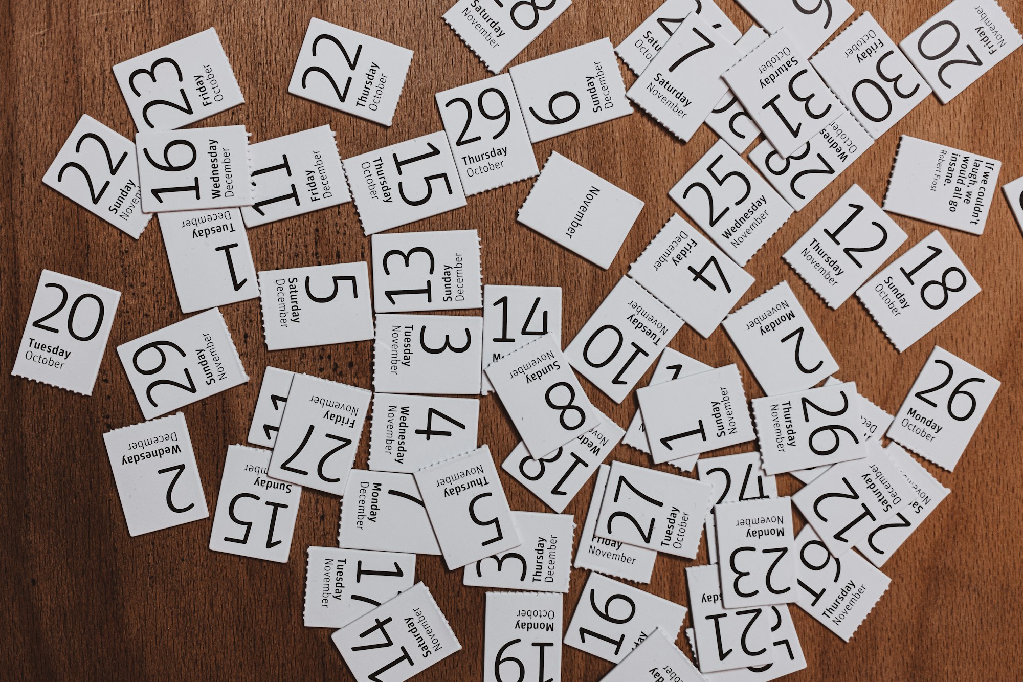 white and brown printer paper with calendar dates