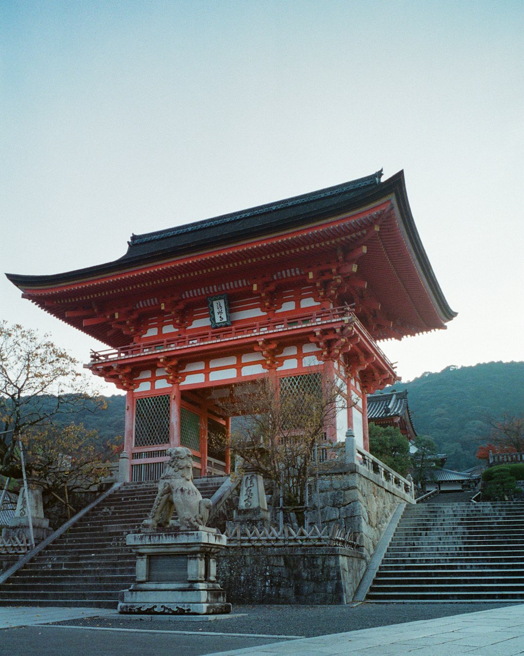 red and white temple under white sky during daytime