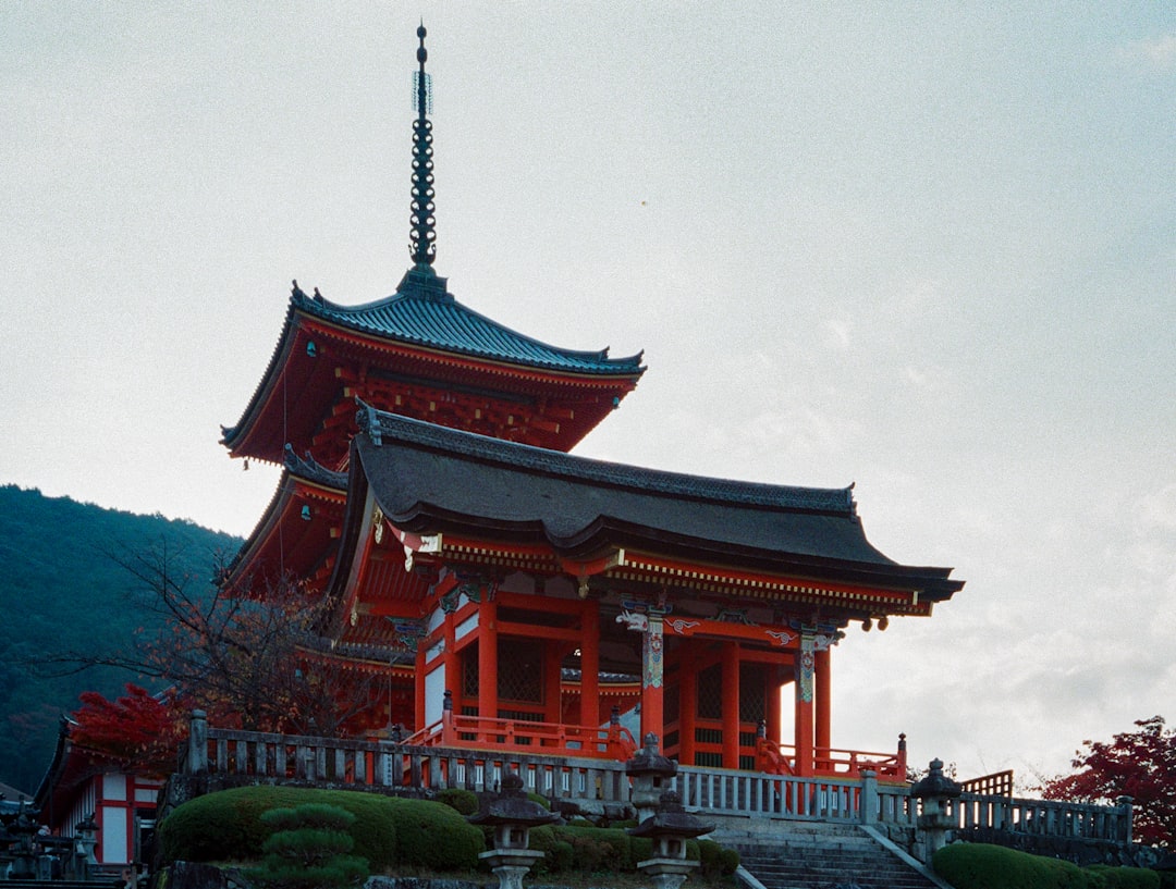 red and black temple under white sky during daytime