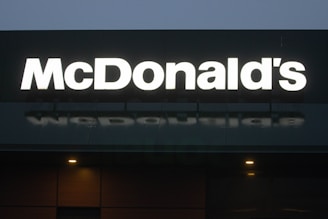 Emergency lighting testing underway in a busy commercial kitchen at McDonald's.
