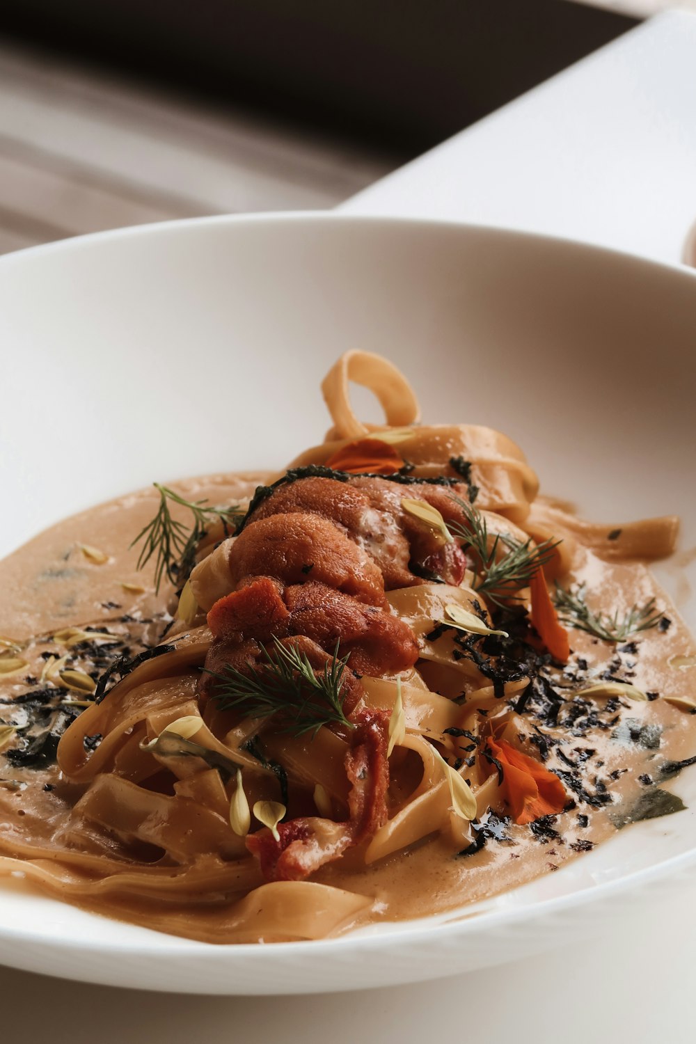 pasta dish on white ceramic plate