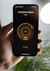 person holding black iphone 4