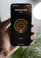 An automated home system being controlled via a smartphone.
