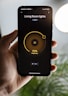 person holding black iphone 4