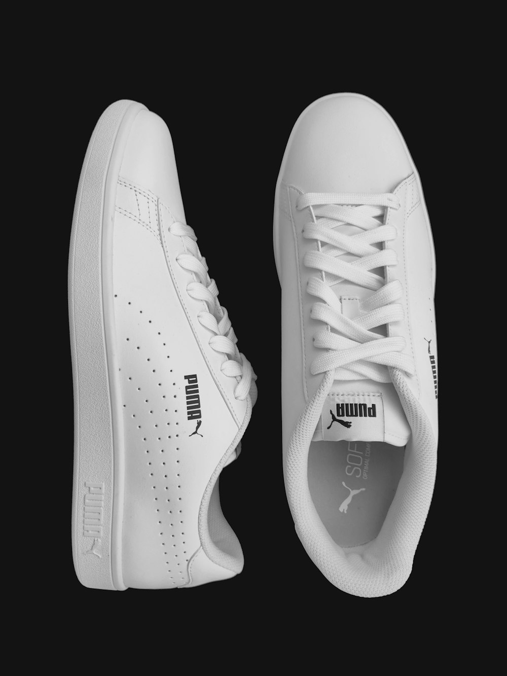 white and black nike athletic shoes