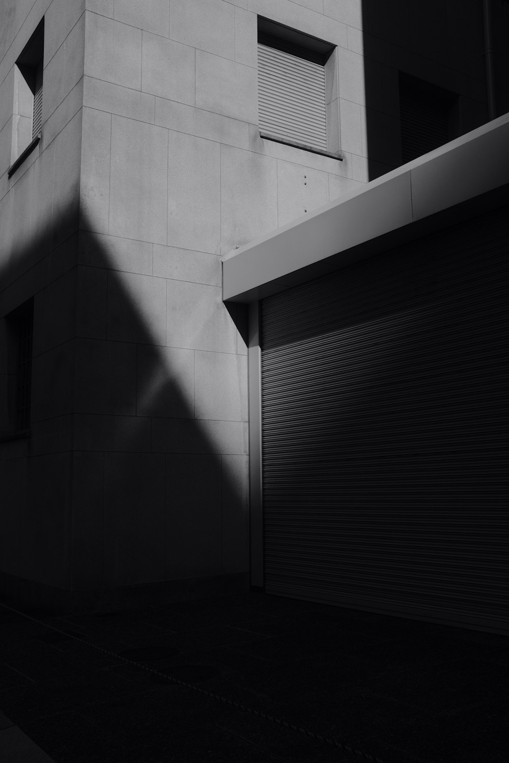 grayscale photo of concrete building