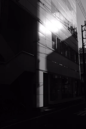 Exterior view of a recently maintained building facade under bright sunlight.