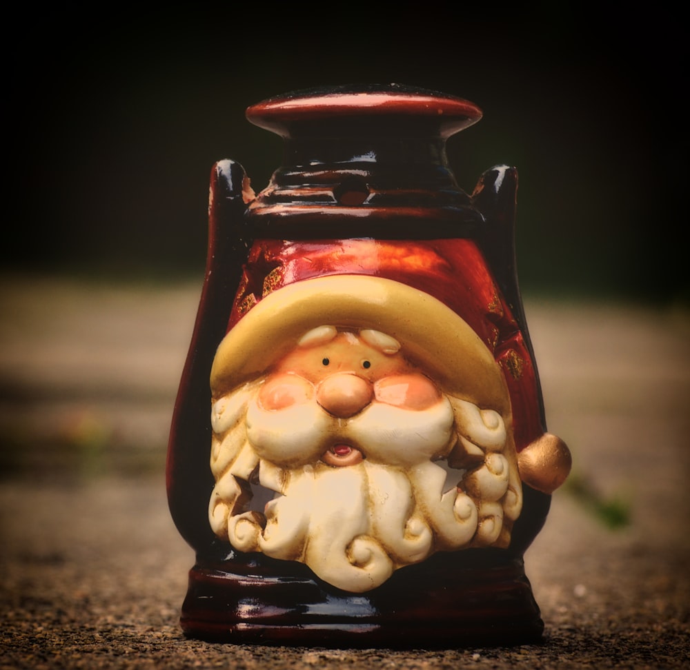 red and white ceramic snowman figurine