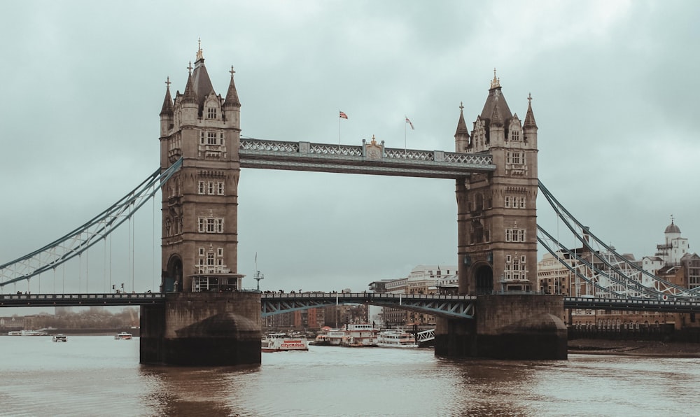 brown concrete bridge under white sky during daytime