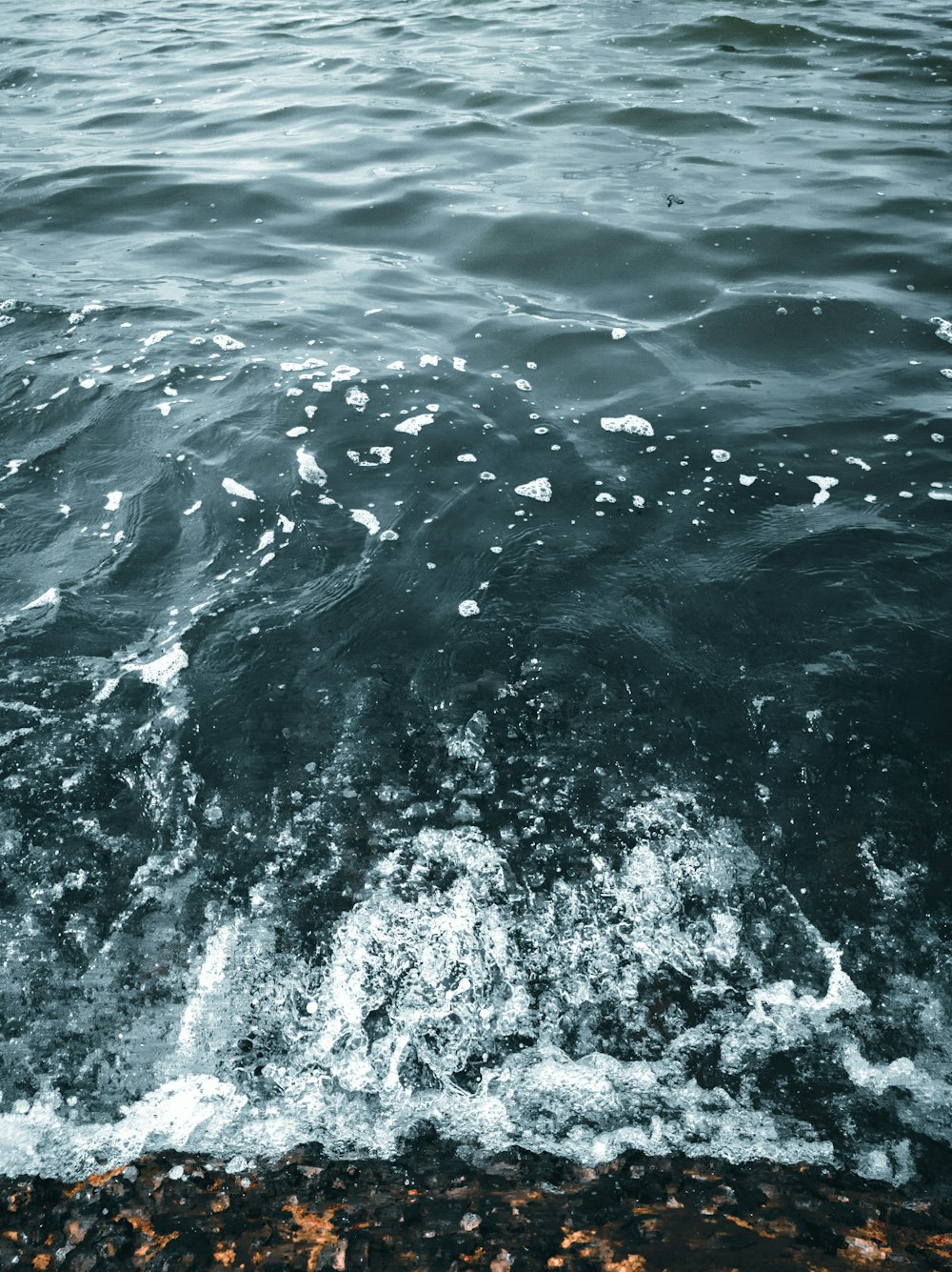 water waves on blue sea during daytime