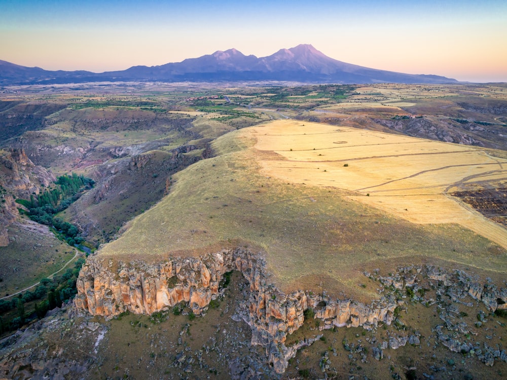 brown and green mountain under blue sky during daytime